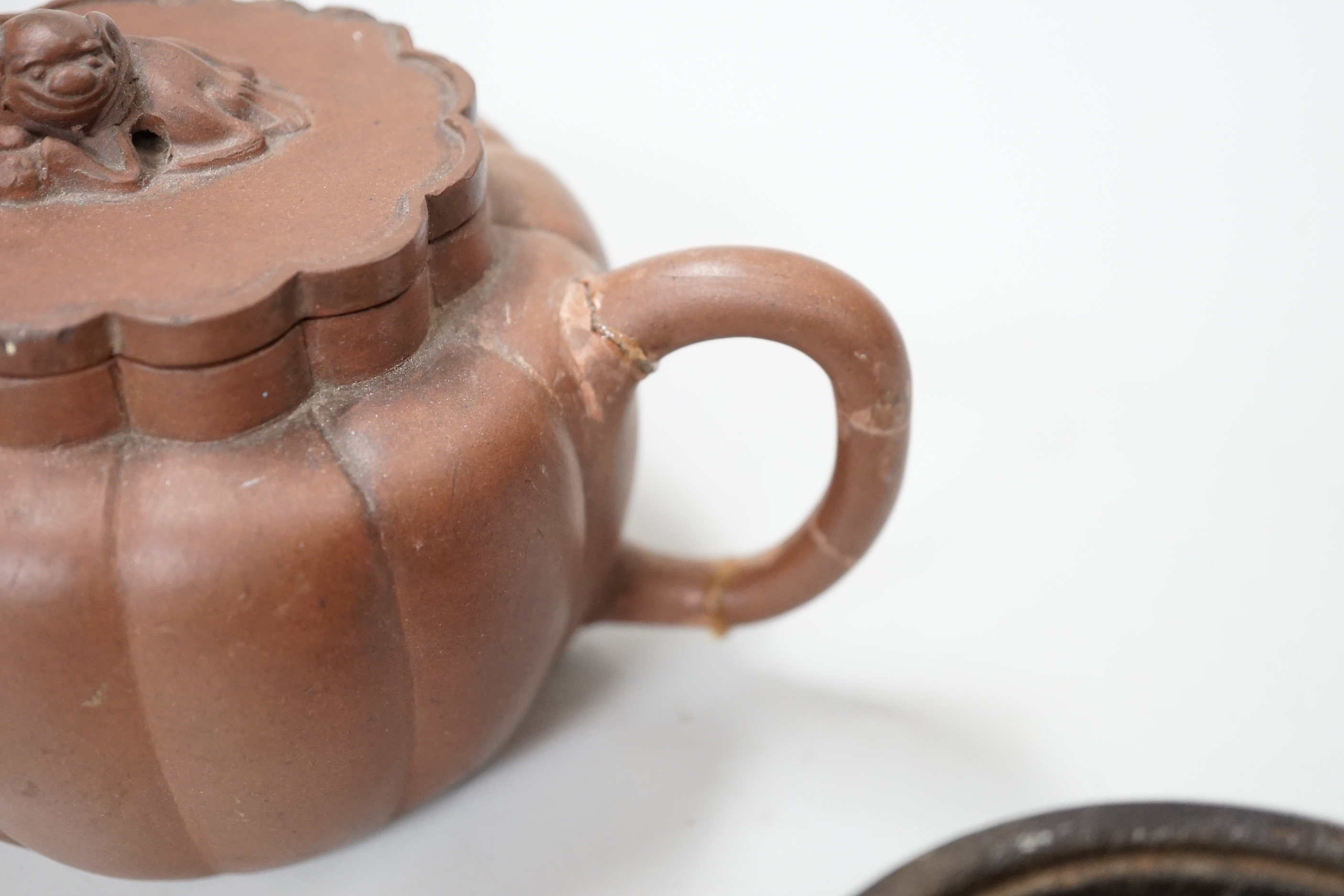 A Chinese Yixing teapot and a bronze censer, teapot 10 cm high